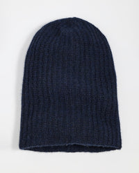 A White + Warren Cashmere Plush Rib Beanie in Deep Navy is laid flat on a plain white background.