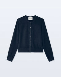 A White & Warren Cashmere Crewneck Cardigan in Deep Navy is laid flat on a light background, showing ribbed cuffs and hem, a button-up front, and an inner collar label.