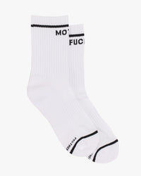 MF Baby Steps in White by Mother are vintage-inspired white tube socks with black stripes and partial black text MO and FUC near the top for a bold twist on your everyday style.