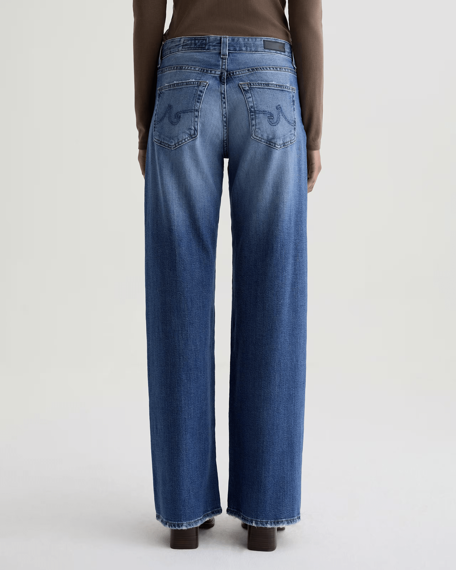 AG Jeans Denim Adria Low Rise Wide Leg in Headline