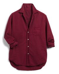 The Frank & Eileen Eileen Relaxed Button Up Shirt in Garnet is a women's Italian cotton shirt with long sleeves, a single chest pocket, relaxed fit, slightly wrinkled texture, and rolled-up sleeves, shown on a white background.