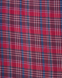 The Orly Blouse in Mulled Wine Plaid by Trovata Birds of Paradis features red and blue plaid with intersecting white, black, and light blue lines for a classic checkered look.