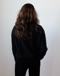 Crew Neck Roll Sleeve Pullover in Black - Bliss Boutiques