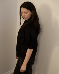 Rosabel Puff Sleeve Top in Black - Bliss Boutiques