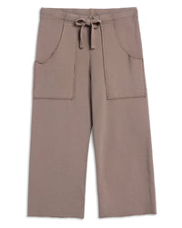 The Frank & Eileen Penny Patch Pocket Sweatpant in Brulee features a cropped wide-leg fit, drawstring waist, large front patch pockets, and raw-edge hems for relaxed everyday style and comfort.