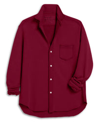 The Frank & Eileen Eileen-Relaxed Button Up Shirt in Garnet French Terry features long sleeves, a relaxed fit, a single chest pocket, a slightly turned-up collar, and is displayed partially rolled against a white background.