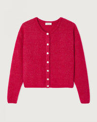 The Vito Cardigan in Magenta Chine by American Vintage is a cropped wool style with a round neckline, white front buttons, and ribbed hem and cuffs, shown laid flat on a light background.