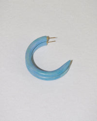 The B&L C Hoop in Large in Maine Sky, a hand-carved chunky mango wood earring with gold posts, is featured solo against a plain, light background.
