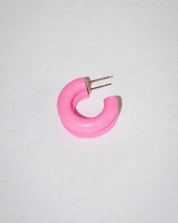 The B&L C Hoop in Mini in Runaway Bunny is a chunky, pink mango wood earring with a metal post and backing, featured on a white background. This handmade Filipino piece showcases sustainable craftsmanship.