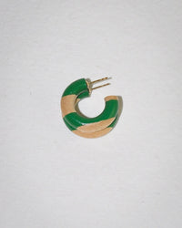 The B&L C Hoop in Mini in Tommy Stripe is a single mango wood earring with alternating green and wood-colored segments and a gold post, inspired by 90s jewelry trends, shown against a plain white background.