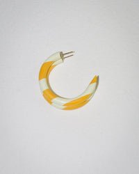 A single B&L C Hoop in Small in Limone Stripe, featuring alternating yellow and white diagonal stripes, rests on a plain white background.