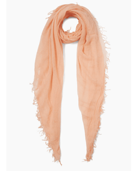The Chan Luu Cashmere & Silk Scarf in Peach, rectangular with frayed edges, is loosely folded in a circle against a plain white background.