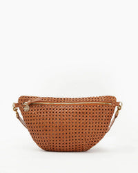 The Clare V. Grande Fanny in Tan Rattan features a zippered top with gold hardware, a detachable strap, and a round charm on the zipper pull, displayed on a plain white background for effortless style.