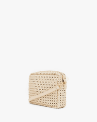 The Clare V. Midi Sac - Rattan in Cream is a small beige woven crossbody bag with a zip closure and matching strap, shown on a white background.