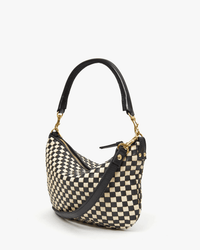 The Clare V. Woven Checker Petit Moyen Messenger in Black & Cream features gold hardware, a short black handle, and a detachable shoulder strap, shown on a plain white background.
