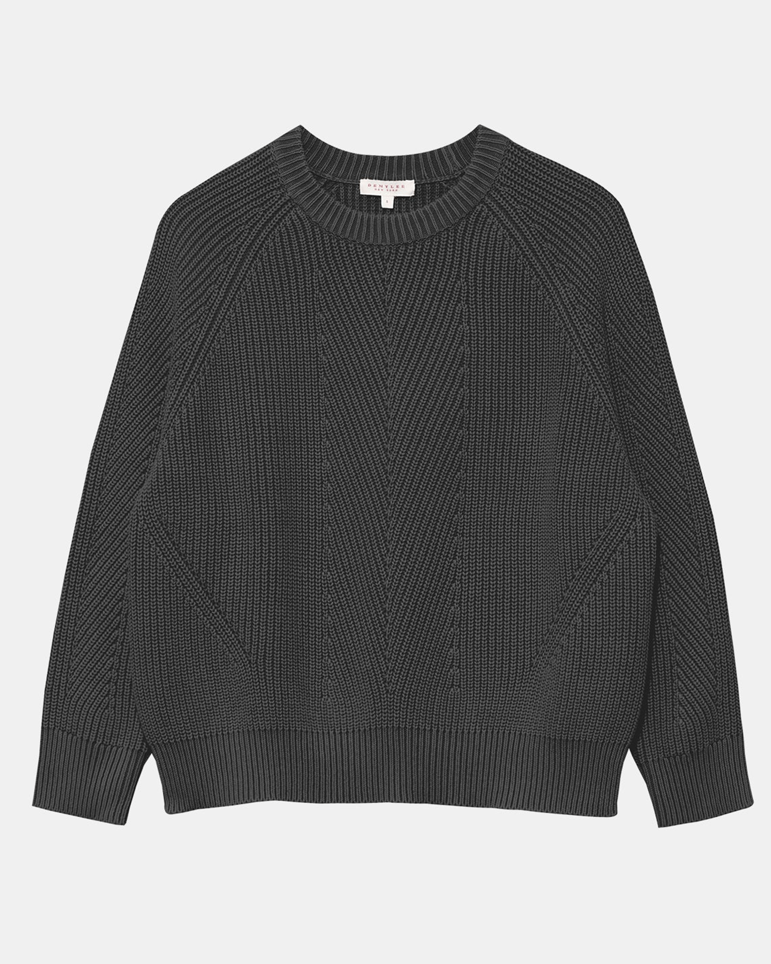 The Chelsea Washed Cotton Sweater in Black by Demylee features a dark gray rib knit, long sleeves, a crew neckline, ribbed cuffs and hem, and a geometric texture on the front. Made from soft organic cotton for comfort and style.