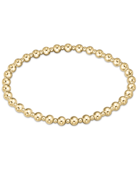 The enewton Classic Grateful Pattern 4mm Bead Bracelet - Gold features polished, gold-filled round beads in a simple, elegant design—ideal for everyday wear.