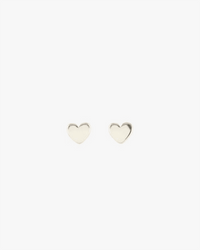 A pair of Kris Nations Tiny Heart Stud Earrings in Sterling Silver displayed on a plain white background.