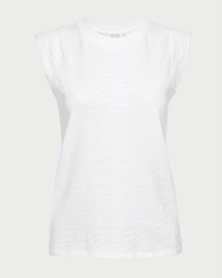The Nation LTD Patti Muscle Tank in Optic White is a sleeveless women’s crew neck made from heavyweight cotton slub, featuring a relaxed fit and premium feel. Shown against a plain light grey background.