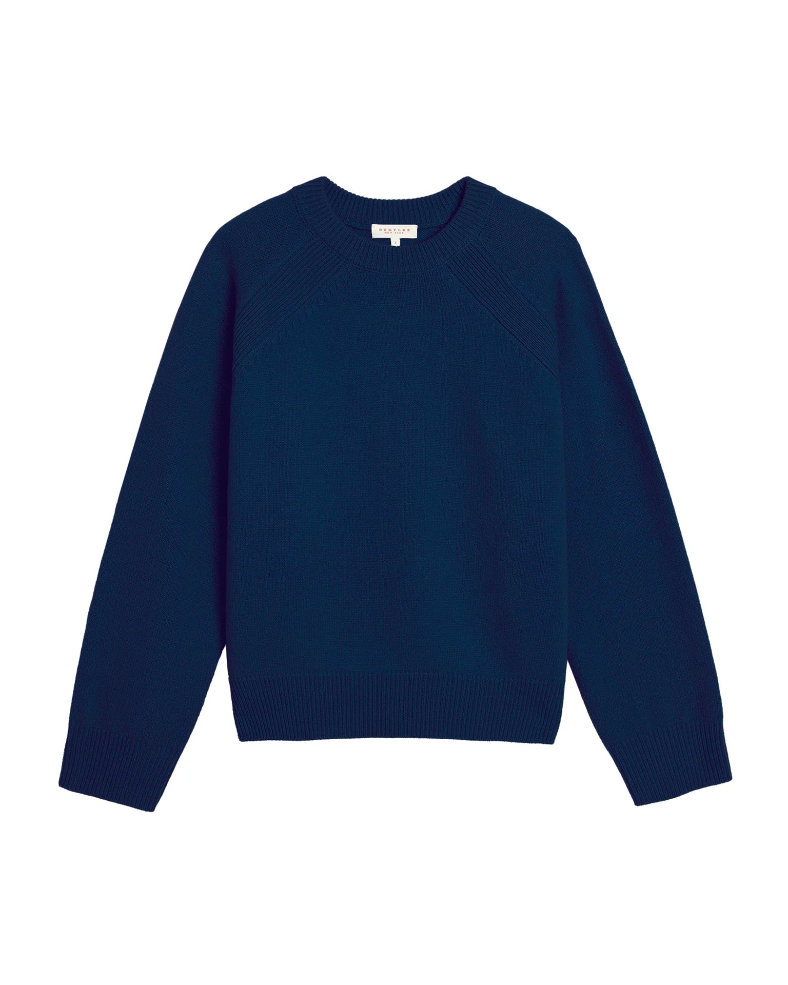 The Demylee Briella Merino Wool Sweater in Sapphire is a plain, long-sleeved crewneck with ribbed cuffs and hem and a relaxed fit, shown flat on a white background.