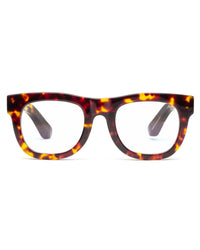The CADDIS D28 Reading Glasses in Turtle feature rectangular, bio-based acetate frames with a tortoiseshell pattern in brown, amber, and yellow, shown facing forward against a white background.