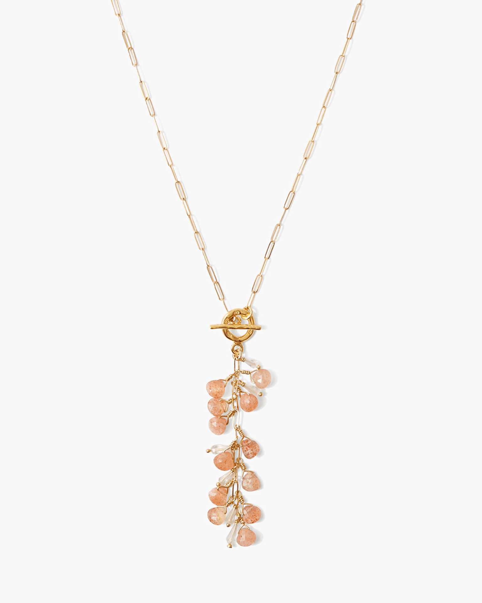 Chan Luu's Pacifica Necklace in Sunstone Mix features a gold chain with a toggle clasp, showcasing clustered peach beads, small white pearls, and aquamarine stones. It's crafted from 18k gold plated sterling silver for timeless elegance.