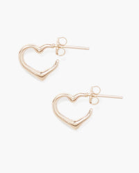 A pair of Chan Luu Open Heart Post Silver Earrings with butterfly backings, displayed on a white background.