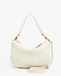 The Moyen Messenger in Cream Woven Checker by Clare V. features gold hardware, a short handle, and an attached long strap, shown against a plain white background.