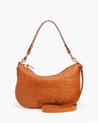 The Clare V. Moyen Messenger in Natural Woven Checker features a curved shape, short top handle, and detachable shoulder strap, all showcased in a tan woven leather design against a plain white background.