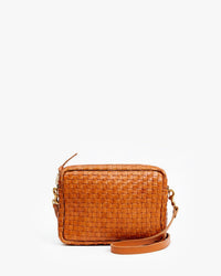 The Clare V. Woven Checker Midi Sac in Natural is a small rectangular crossbody bag with a woven checker design, gold hardware, and an adjustable strap, shown against a plain white background.