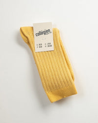 A pair of Victoire Extra Soft Glittery Socks in Camomille by Collegien, with a cardboard tag showing EU, US, and KR sizes and the brand name, made in France, displayed on a plain white background.