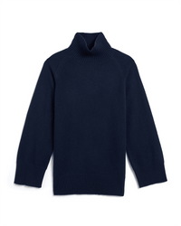The Demylee Porter Sweater in Navy, a cashmere turtleneck with ribbed cuffs, hem, and collar, is shown laid flat on a white background.