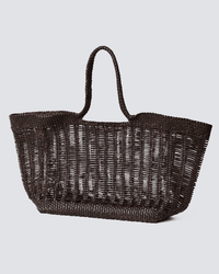 The Window Shopper in Dark Brown from Dragon Diffusion is a large tote with braided handles and a roomy open design, handwoven in dark brown leather and shown against a plain light gray background.