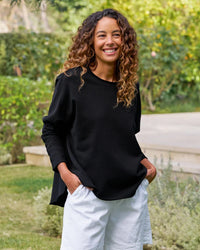 Anna Long Sleeve Capelet in Black - Bliss Boutiques