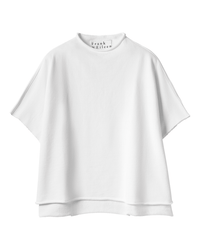 The Audrey Funnel Neck Capelet in White by Frank & Eileen is a loose-fitting, short-sleeve top with a layered hem and mock neck capelet style, shown on a plain white background; the collar label displays the Frank & Eileen brand.
