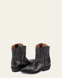 FRYE Billy Short in Black leather ankle boots with short heels and pull tabs are shown on a light beige background. One boot stands upright, while the other is angled forward.