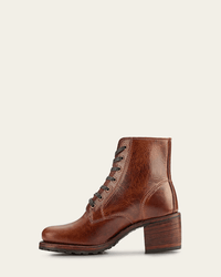 The FRYE Sabrina 6G Lace Up in Cognac is a brown oil-tanned leather boot with a chunky heel and textured finish, shown in side profile against a plain light background.