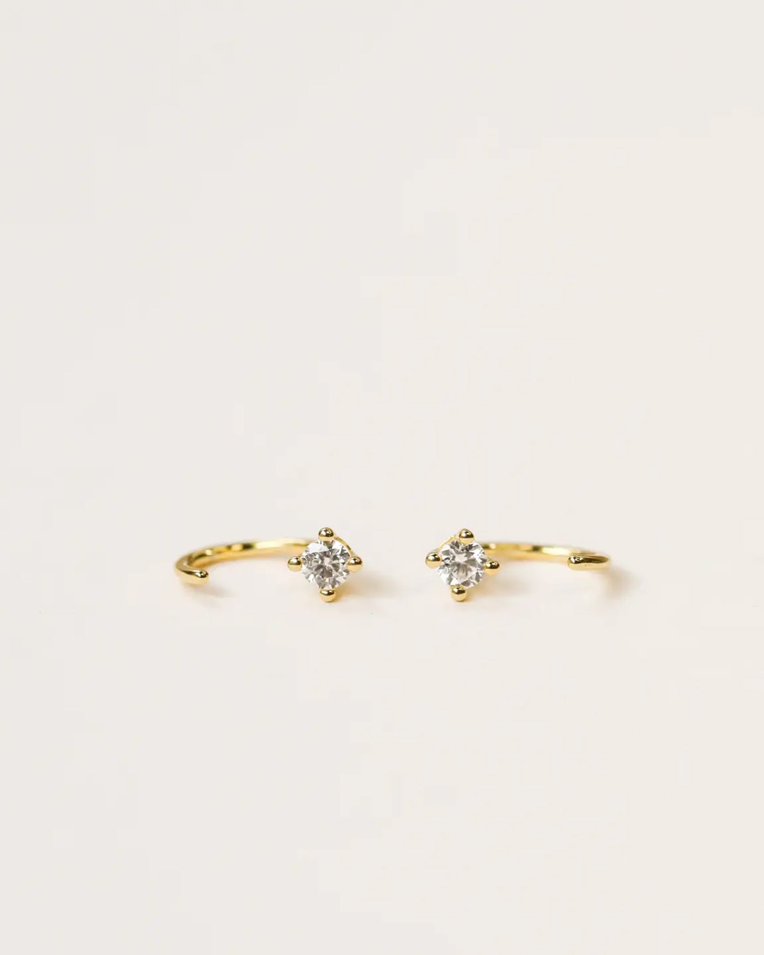 JaxKelly CZ Huggies - White - Gold Earrings