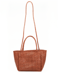 The Annette Petit Cuir Bag in Picante by Maison N.H Paris is a brown woven mini tote with two short handles and a long strap, handmade in India and shown against a plain white background.