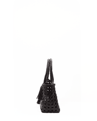 Side view of the Malibu Cuir Bag in Black by Maison N.H Paris—a handmade black buffalo leather tote with double handles and tassel detail, displayed against a plain white background.