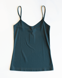 The Del Adj Strap Cami in Juniper by Only Hearts features thin adjustable straps and is laid flat on a white background.