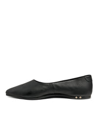 The beek.. Swoop in Black is a black leather ballet shoe with a rounded toe and two metallic studs on the outer heel, featuring a memory foam footbed, shown in side profile against a white background.