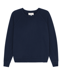 The College Sweatshirt in True Navy by the Great features a relaxed fit, long sleeves, crew neckline, and is made from 100% cotton. Shown on a white background.