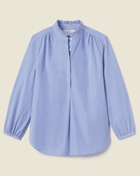 The Trovata Birds of Paradis Sara B Henley Shirt in Blue/White Stripe features vertical stripes, a round ruffle collar, partial button placket, and gathered details at the shoulders and cuffs, displayed flat against a plain background.