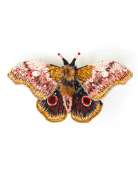 The Trovelore Emperor Mopane Moth Brooch Pin is a detailed, handmade accessory with pink, gold, brown, and black embroidered wings and red accents, shown on a white background.