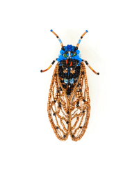 The Trovelore Periodical Cicada Brooch Pin is a handmade, beaded accessory with a blue head and thorax, orange and gold wings, and detailed beadwork on white—an ideal collectible for fans of Trovelore brooches.