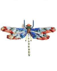 The Trovelore Sunrise Dragonfly Brooch Pin features red, blue, white, and green sequins and beads in a hand-embroidered design with detailed wings and a beaded body, displayed on a plain white background.