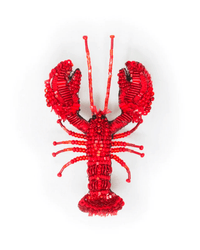 The Trovelore True Lobster Brooch Pin, handmade in India with beads and sequins, showcases detailed claws, legs, and antennae. This hand-embroidered brooch is presented on a white background.