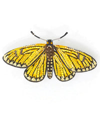 The Trovelore Yellow Coster Butterfly Brooch Pin features yellow, black, and orange sequins and beads, hand-embroidered to mimic a butterfly's look. Shown from above on a white background—a striking decorative accessory.