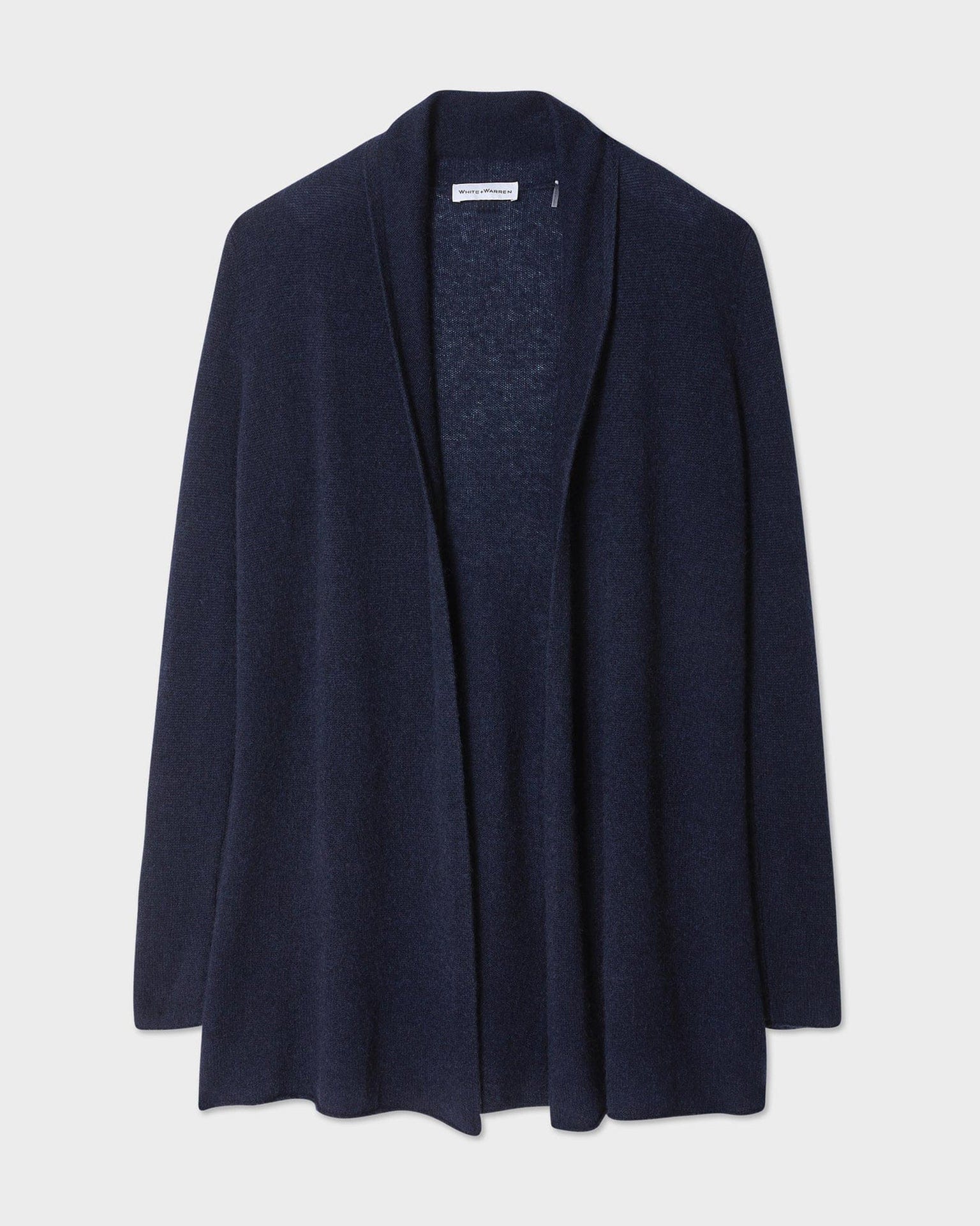 White & Warren's Cashmere Trapeze Cardigan in Deep Navy features long sleeves and soft, lightweight cashmere, shown flat on a white background.
